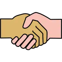 An image of two shaking hands of different races.