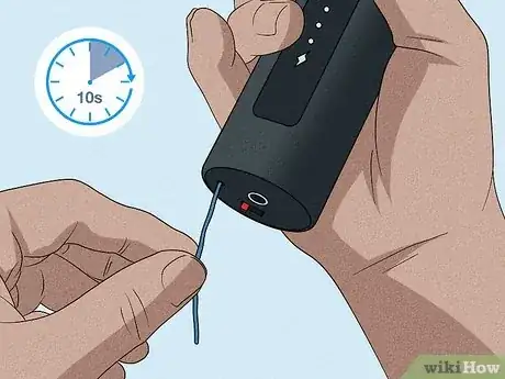 Image titled Reset Massage Gun Step 1