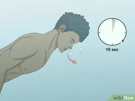 Image titled Swim Underwater Without Holding Your Nose Step 8