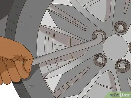 Image titled Change a Tire on a 1999‐2004 Jeep Grand Cherokee (WJ) Step 17