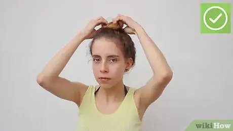 Image titled Do a Messy Bun (for Curly Hair) Step 16