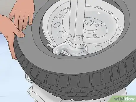 Image titled Put Tires on Rims Step 8