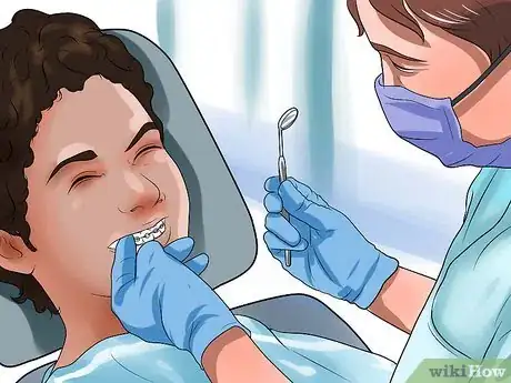 Image titled Clean Teeth With Braces Step 12