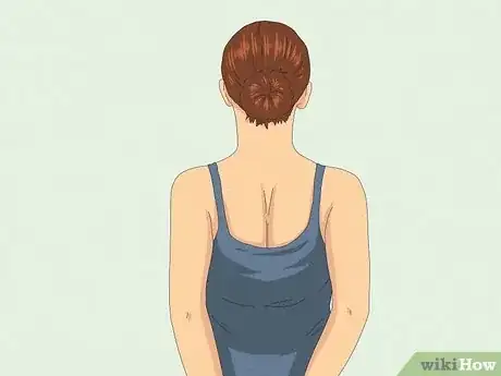 Image titled Fix Rounded Shoulders Step 1