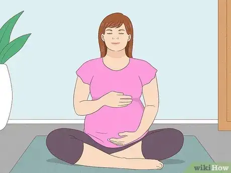 Image titled Lie Down in Bed During Pregnancy Step 6