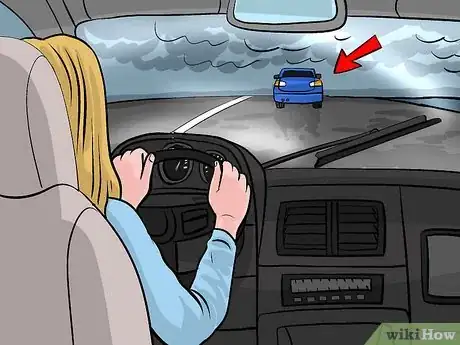 Image titled Drive Safely During a Thunderstorm Step 14