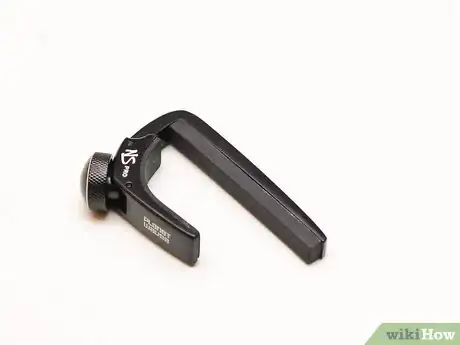 Image titled Use a Guitar Capo Step 1