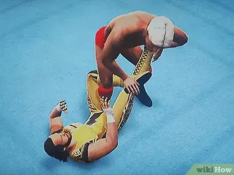 Image titled Do the Figure Four Leg Lock Step 3