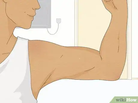 Image titled Get Big Muscles Using Dumbbells Step 1