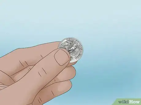 Image titled Hold a Door Open with a Coin Step 1