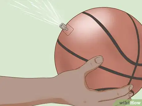 Image titled Pump a Spalding Neverflat Basketball Step 11