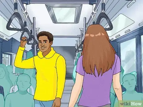 Image titled Remain Standing While Riding a Bus Step 2