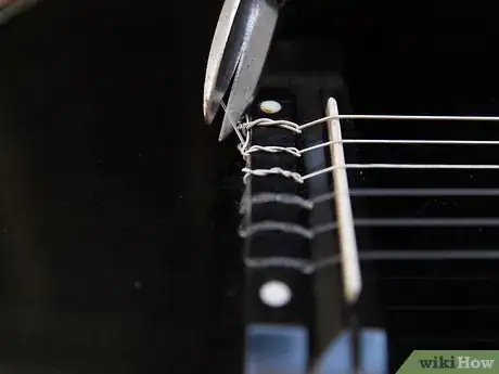 Image titled Change Strings on an Acoustic Guitar Step 16