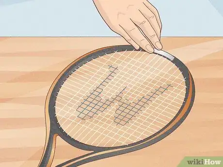 Image titled Add Lead Tape to a Tennis Racquet Step 3