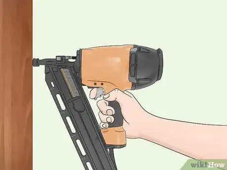 Image titled Use a Nail Gun Step 14