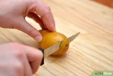 Image titled Peel Potatoes With an Ordinary Kitchen Knife Step 6