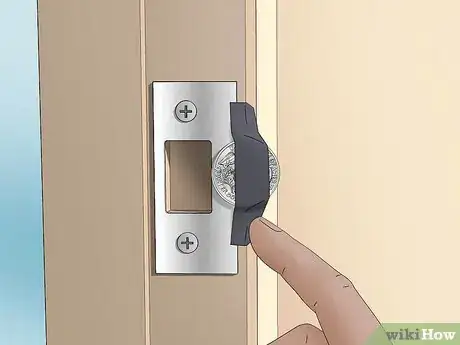 Image titled Hold a Door Open with a Coin Step 7