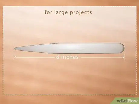 Image titled Use a Bone Folder Step 12