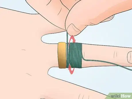 Image titled Remove a Ring with a String Step 3