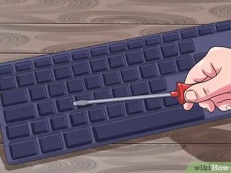 Image titled Clean Under Laptop Keyboard Keys Step 1