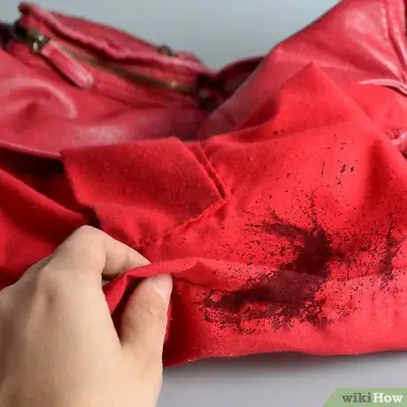 Image titled Remove Ink Stains from a Purse Lining Step 1  