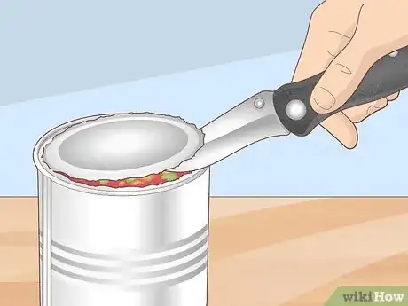 Image titled Open a Can Without a Can Opener Step 12