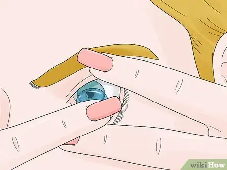 Image titled Put on Contact Lenses with Long Nails Step 4