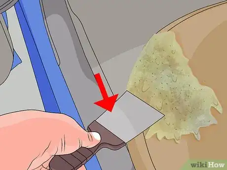 Image titled Remove Vomit From a Car Interior Step 1