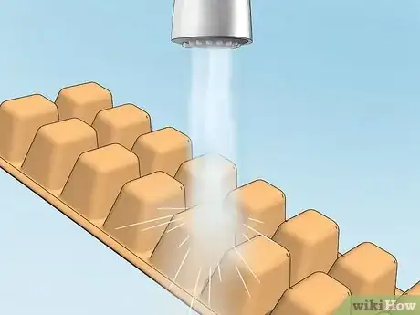 Image titled Remove Ice Cubes From a Tray Step 1