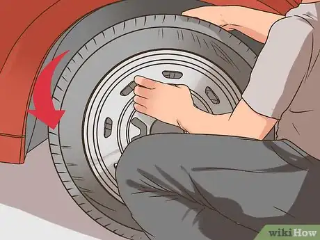 Image titled Change a Tire on a 1999‐2004 Jeep Grand Cherokee (WJ) Step 11