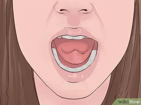 Image titled Roll Your Tongue Step 1