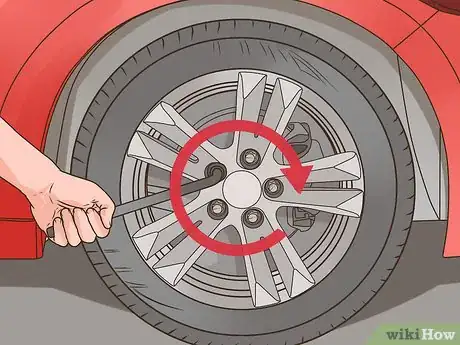 Image titled Change a Tire on a 1999‐2004 Jeep Grand Cherokee (WJ) Step 14