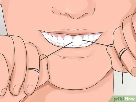 Image titled Pick Your Teeth Without a Toothpick Step 4