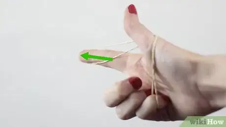 Image titled Turn Your Hand Into a Rubber Band Gun Step 5