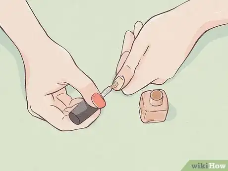 Image titled Dry Your Painted Nails Quickly Step 4