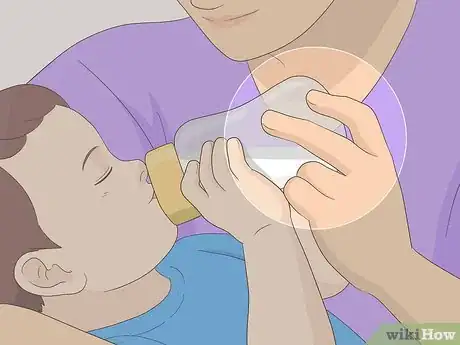 Image titled Get Your Child to Hold Their Own Bottle Step 7