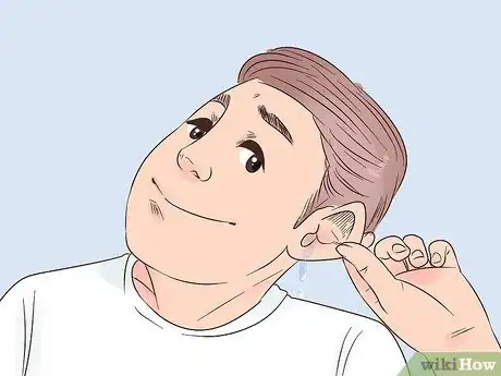 Image titled Remove Fluid in Ears Step 1