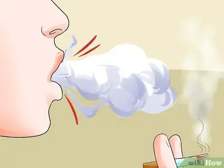 Image titled Learn Smoking Tricks Step 7