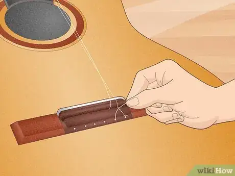 Image titled Change Classical Guitar Strings Step 3