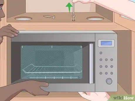 Image titled Remove an Over‐the‐Range Microwave Step 3