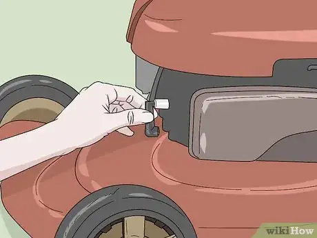 Image titled Remove a Lawn Mower Wheel Step 1