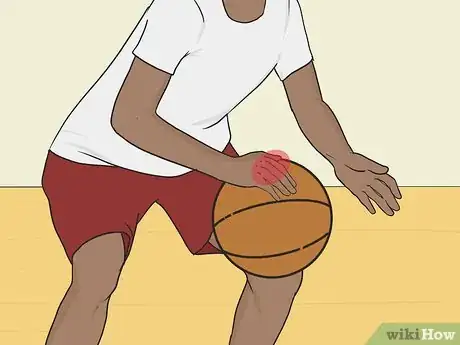 Image titled Dribble a Basketball Between the Legs Step 7.jpeg