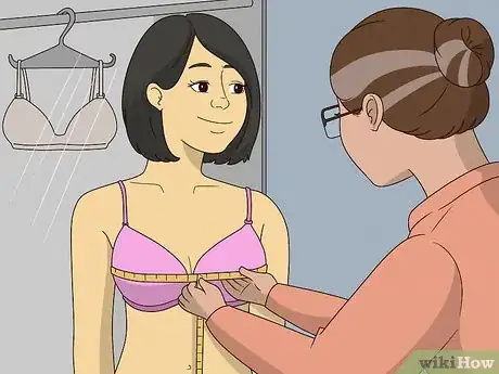 Image titled Stop a Bra from Riding Up Step 1