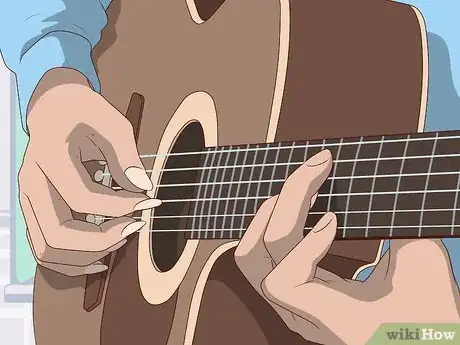 Image titled Play Guitar with Long Nails Step 2.jpeg