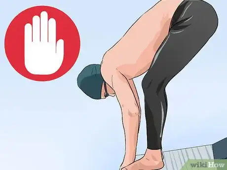 Image titled Dive off a Starting Block Step 12