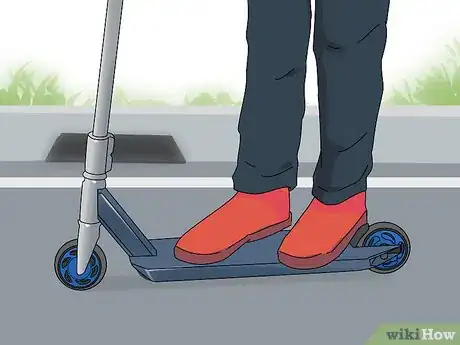 Image titled Do a Tailwhip on a Scooter Step 1