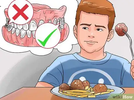 Image titled Remove Food out of Holes from Extracted Wisdom Teeth Step 12