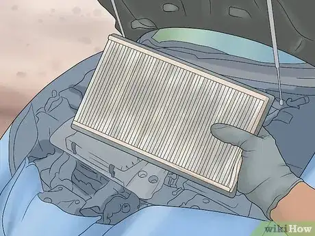 Image titled Clean an Air Filter Step 1