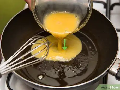 Image titled Make Cheesy Scrambled Eggs Step 4