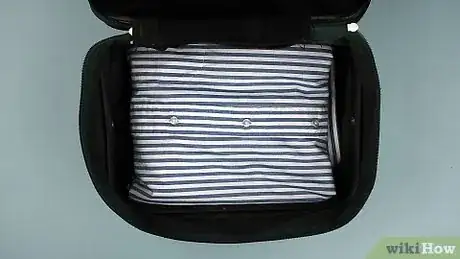 Image titled Fold a Shirt for Travel Step 7